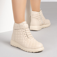 Бежови дамски ватирани боти с цип и велкро лепенка за коригиране, на олекотена подметка