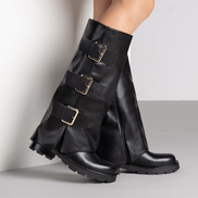Черни дамски ботуши със златисти катарами на стабилна подметка
